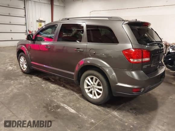 2015 Dodge Journey SXT with VIN 3C4PDDBG3FT596818, listed as a IAAI auction lot 42722530 with 148,968 mi miles and . Bid and sale history available at DreamBid. Image 3.