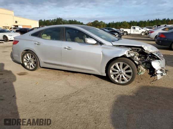 2012 Hyundai Azera с VIN KMHFH4JGXCA173802, выставлен на аукционе Copart как лот 82128484 с пробегом 111 475 миль миль и Списание • Salvage title. История ставок и продаж доступна на DreamBid. Изображение 4.