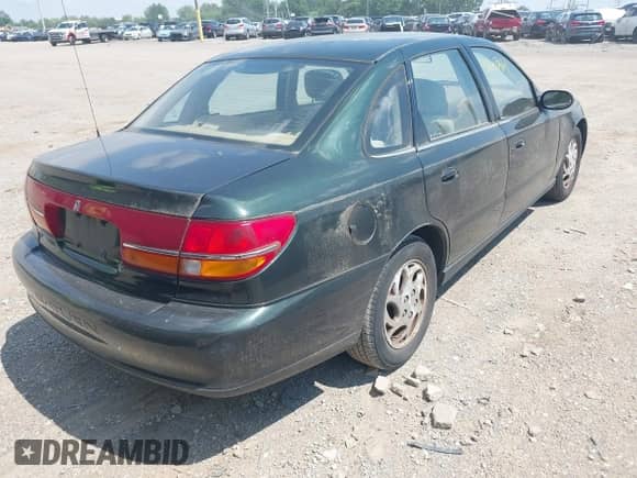 2002 Saturn LS with VIN 1G8JU54F52Y585628, listed as a IAAI auction lot 42603861 with 66,436 mi miles and . Bid and sale history available at DreamBid. Image 4.