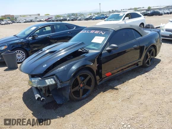 2002 Ford Mustang GT Deluxe z VIN 1FAFP45X92F229236, wystawiony jako IAAI lot #42565552 z przebiegiem 122 504 mil mil oraz . Historia ofert i sprzedaży dostępna na DreamBid. Obrazek 18.