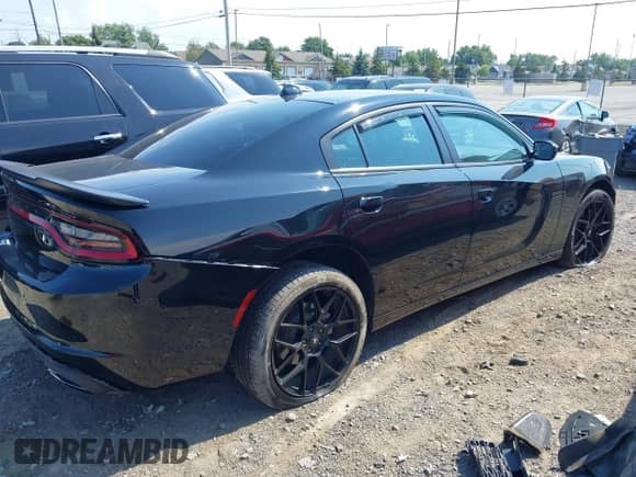 2023 Dodge Charger SXT with VIN 2C3CDXJG6PH519988, listed as a IAAI auction lot 42963606 with 31,150 mi miles and . Bid and sale history available at DreamBid. Image 4.