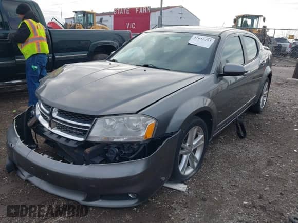 2011 Dodge Avenger Heat with VIN 1B3BD1FGXBN584583, listed as a IAAI auction lot 41042293 with 162,976 mi miles and . Bid and sale history available at DreamBid. Image 2.