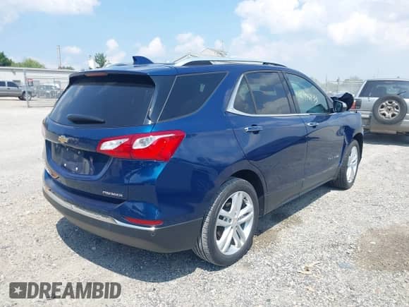 2020 Chevrolet Equinox Premier with VIN 2GNAXNEV4L6147197, listed as a IAAI auction lot 42996933 with 36,555 mi miles and . Bid and sale history available at DreamBid. Image 4.