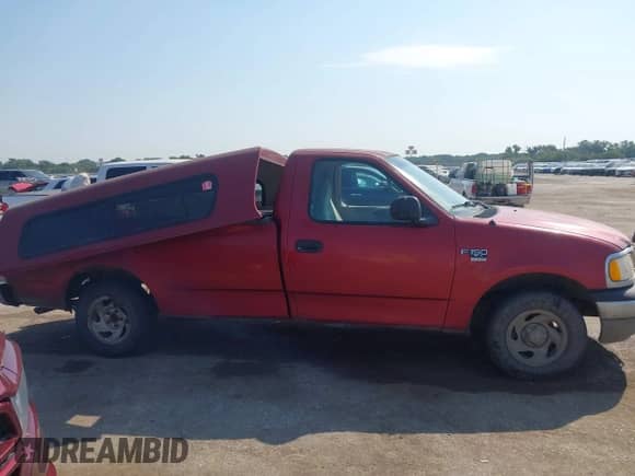 2001 Ford F-150 XL with VIN 1FTRF17W41NA13618, listed as a IAAI auction lot 43245729 with 96,600 mi miles and . Bid and sale history available at DreamBid. Image 13.