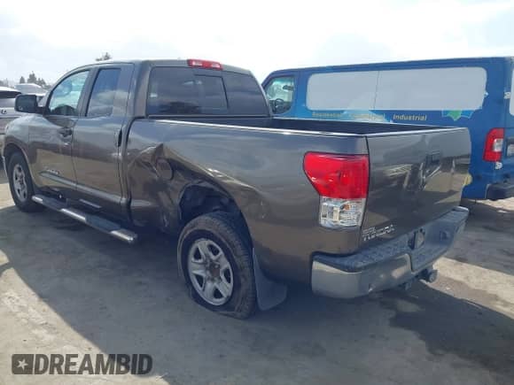 2011 Toyota Tundra with VIN 5TFRM5F14BX026510, listed as a IAAI auction lot 43441230 with 358,532 mi miles and . Bid and sale history available at DreamBid. Image 3.