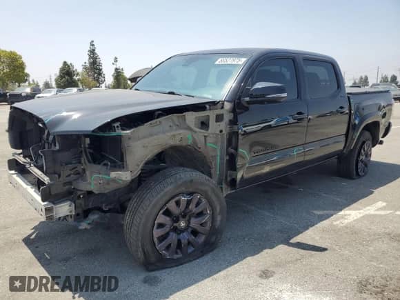 2021 Toyota Tacoma Limited with VIN 3TYGZ5AN8MT038529, listed as a Copart auction lot 58527975 with 46,147 mi miles and Salvage title. Bid and sale history available at DreamBid. Image 1.