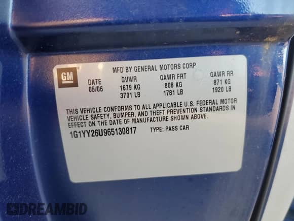 2006 Chevrolet Corvette with VIN 1G1YY26U965130817, listed as a Copart auction lot 76907154 with 98,280 mi miles and Salvage title. Bid and sale history available at DreamBid. Image 12.