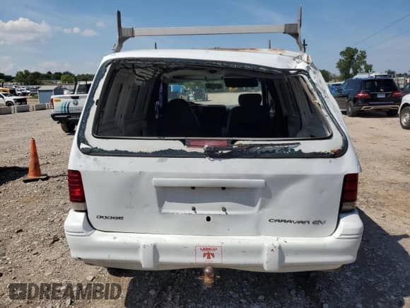 1994 Dodge Caravan with VIN 2B7GH1131RR570758, listed as a Copart auction lot 68755955 with 310,763 mi miles and Salvage title. Bid and sale history available at DreamBid. Image 6.