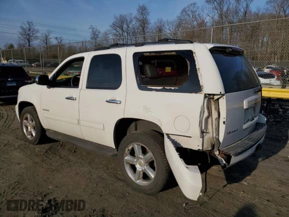 2013 Chevrolet Tahoe LS with VIN 1GNSKAE04DR359670, listed as a Copart auction lot 43388245 with 122,470 mi miles and Salvage title. Bid and sale history available at DreamBid. Image 2.