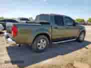 2005 Nissan Frontier SE with VIN 1N6AD07U15C402856, listed as a Copart auction lot 65883815 with 130,400 mi miles and Salvage title. Bid and sale history available at DreamBid. Image 3.
