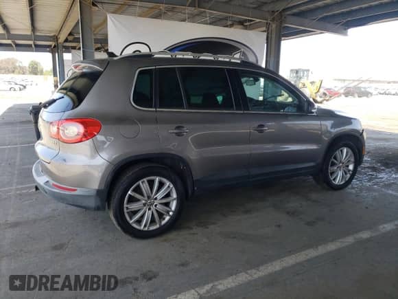 2010 Volkswagen Tiguan с VIN WVGAV9AX8AW511830, выставлен на аукционе Copart как лот 57359675 с пробегом 147 672 миль миль и Чистый • Clean title. История ставок и продаж доступна на DreamBid. Изображение 3.