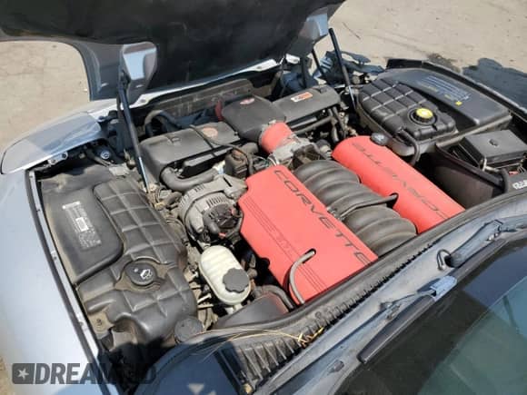 2003 Chevrolet Corvette Z06 z VIN 1G1YY12S935105216, wystawiony jako Copart lot #68721585 z przebiegiem 99 972 mil mil oraz Szkoda całkowita • Salvage title. Historia ofert i sprzedaży dostępna na DreamBid. Obrazek 11.
