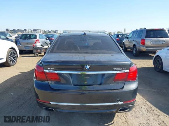 2013 BMW 7 Series 750Li xDrive with VIN WBAYF8C58DD141658, listed as a IAAI auction lot 42327776 with 130,428 mi miles and . Bid and sale history available at DreamBid. Image 16.