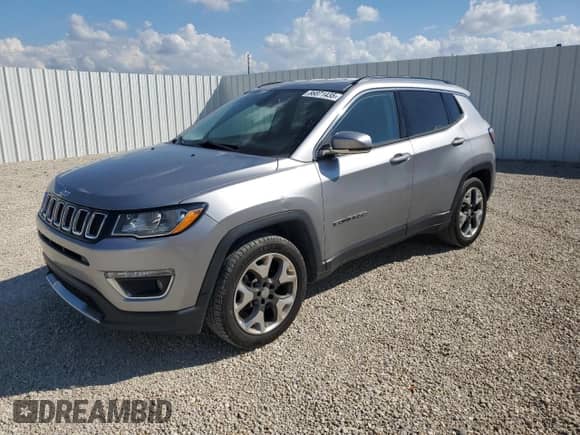 2019 Jeep Compass Limited with VIN 3C4NJCCB2KT676098, listed as a Copart auction lot 86871435 with 154,322 mi miles and Clean title. Bid and sale history available at DreamBid. Image 1.