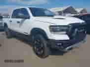 2022 Ram 1500 Rebel z VIN 1C6SRFLT4NN158883, wystawiony jako IAAI lot #43517383 z przebiegiem 45 447 mil mil oraz . Historia ofert i sprzedaży dostępna na DreamBid. Obrazek 1.