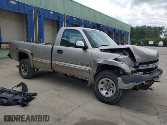 2002 Chevrolet Silverado 2500HD LS with VIN 1GCHK24U32E245693, listed as a Copart auction lot 62677345 with 212,141 mi miles and Salvage title. Bid and sale history available at DreamBid. Image 4.