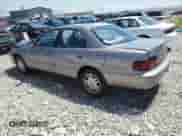 1995 Toyota Camry XLE with VIN JT2GK13E2S0113465, listed as a Copart auction lot 67060765 with 191,104 mi miles and Salvage title. Bid and sale history available at DreamBid. Image 2.