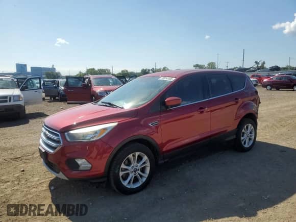 2017 Ford Escape SE с VIN 1FMCU9GD8HUC66378, выставлен на аукционе Copart как лот 70914105 с пробегом 136 895 миль миль и Списание • Salvage title. История ставок и продаж доступна на DreamBid. Изображение 1.