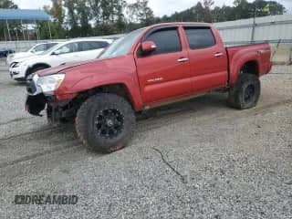 2015 Toyota Tacoma z VIN 3TMLU4EN4FM189688, wystawiony jako Copart lot #84589895 z przebiegiem 57 737 mil mil oraz Szkoda całkowita • Salvage title. Historia ofert i sprzedaży dostępna na DreamBid. Obrazek 1.