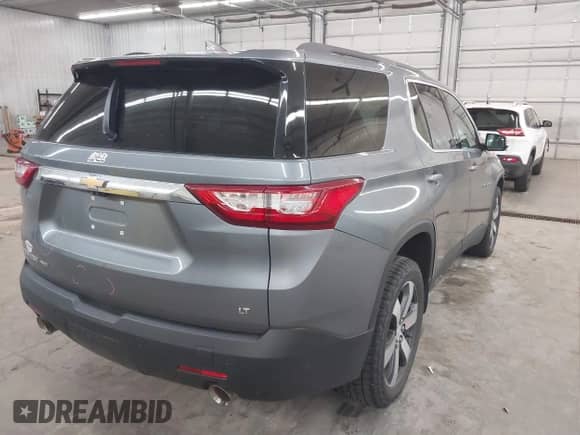 2020 Chevrolet Traverse LT with VIN 1GNEVHKW4LJ256719, listed as a IAAI auction lot 42629566 with 110,357 mi miles and . Bid and sale history available at DreamBid. Image 4.