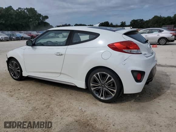 2017 Hyundai Veloster Turbo с VIN KMHTC6AE9HU310410, выставлен на аукционе Copart как лот 70563525 с пробегом 75 826 миль миль и Списание • Salvage title. История ставок и продаж доступна на DreamBid. Изображение 2.