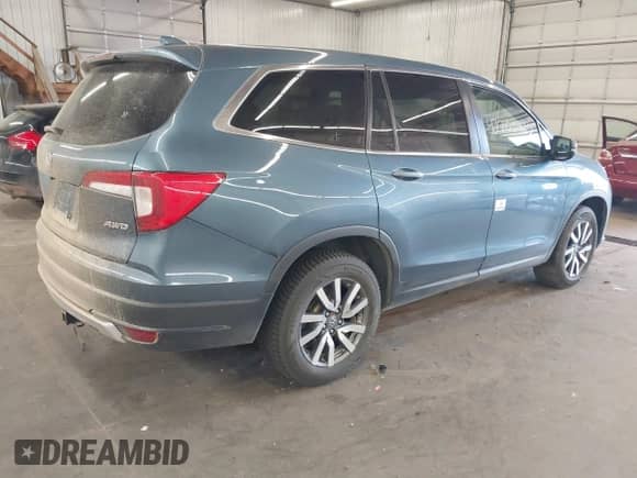 2020 Honda Pilot EX z VIN 5FNYF6H30LB038045, wystawiony jako IAAI lot #42203482 z przebiegiem Nie podano mil oraz . Historia ofert i sprzedaży dostępna na DreamBid. Obrazek 4.