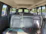 2008 Chevrolet Express Passenger z VIN 1GAHG39KX81169168, wystawiony jako Copart lot #61792105 z przebiegiem Nie podano mil oraz Szkoda całkowita • Salvage title. Historia ofert i sprzedaży dostępna na DreamBid. Obrazek 10.