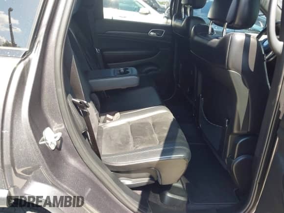 2018 Jeep Grand Cherokee Laredo E with VIN 1C4RJEAG6JC304365, listed as a IAAI auction lot 43023758 with 140,626 mi miles and . Bid and sale history available at DreamBid. Image 8.
