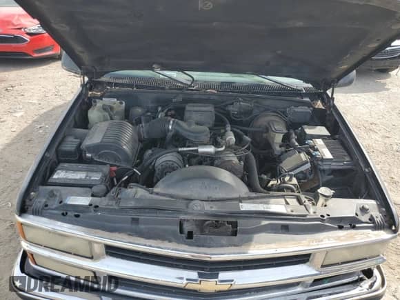1999 Chevrolet Tahoe Z71 z VIN 1GNEK13R6XJ411348, wystawiony jako Copart lot #71179204 z przebiegiem 162 752 mil mil oraz Szkoda całkowita • Salvage title. Historia ofert i sprzedaży dostępna na DreamBid. Obrazek 12.