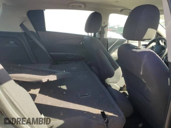 2014 Chevrolet Sonic LT z VIN 1G1JD6SH2E4142678, wystawiony jako Copart lot #74555124 z przebiegiem Nie podano mil oraz Szkoda całkowita • Salvage title. Historia ofert i sprzedaży dostępna na DreamBid. Obrazek 11.