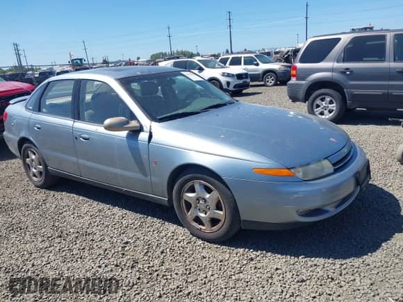 2002 Saturn LS with VIN 1G8JW54R82Y562283, listed as a IAAI auction lot 42394058 with 116,300 mi miles and . Bid and sale history available at DreamBid. Image 1.