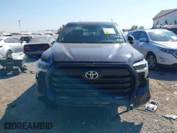 2025 Toyota Tundra SR with VIN 5TFLA5DB7SX262949, listed as a IAAI auction lot 43211862 with 7,809 mi miles and . Bid and sale history available at DreamBid. Image 12.
