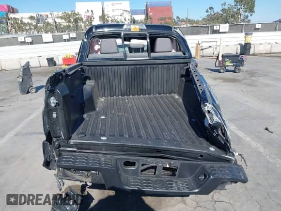 2022 Toyota Tacoma SR with VIN 3TYAX5GNXNT053716, listed as a IAAI auction lot 42853297 with 42,989 mi miles and . Bid and sale history available at DreamBid. Image 16.
