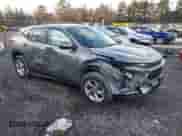 2024 Chevrolet Trax LS with VIN KL77LFE22RC080610, listed as a IAAI auction lot 41208368 with 25,525 mi miles and . Bid and sale history available at DreamBid. Image 1.