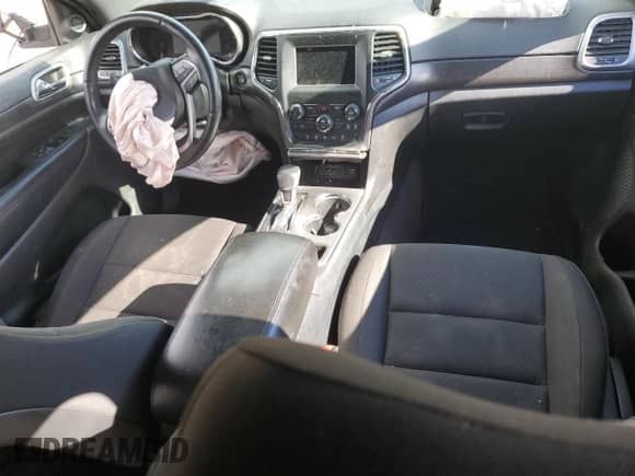 2018 Jeep Grand Cherokee Laredo z VIN 1C4RJEAG9JC399861, wystawiony jako Copart lot #54886494 z przebiegiem 100 762 mil mil oraz Szkoda całkowita • Salvage title. Historia ofert i sprzedaży dostępna na DreamBid. Obrazek 8.