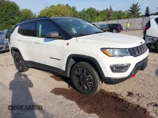 2020 Jeep Compass Trailhawk with VIN 3C4NJDDB8LT184276, listed as a IAAI auction lot 43313811 with 90,206 mi miles and . Bid and sale history available at DreamBid. Image 1.