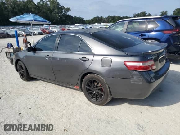 2009 Toyota Camry LE z VIN 4T1BE46K29U296523, wystawiony jako Copart lot #80359865 z przebiegiem 190 864 mil mil oraz Czysty tytuł • Clean title. Historia ofert i sprzedaży dostępna na DreamBid. Obrazek 2.