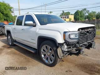 2018 GMC Sierra 1500 Denali with VIN 3GTU2PEJ1JG129206, listed as a IAAI auction lot 42813057 with 102,036 mi miles and . Bid and sale history available at DreamBid. Image 1.