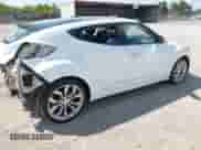 2013 Hyundai Veloster w/Black Int z VIN KMHTC6AD3DU178911, wystawiony jako IAAI lot #42951388 z przebiegiem 106 366 mil mil oraz . Historia ofert i sprzedaży dostępna na DreamBid. Obrazek 4.