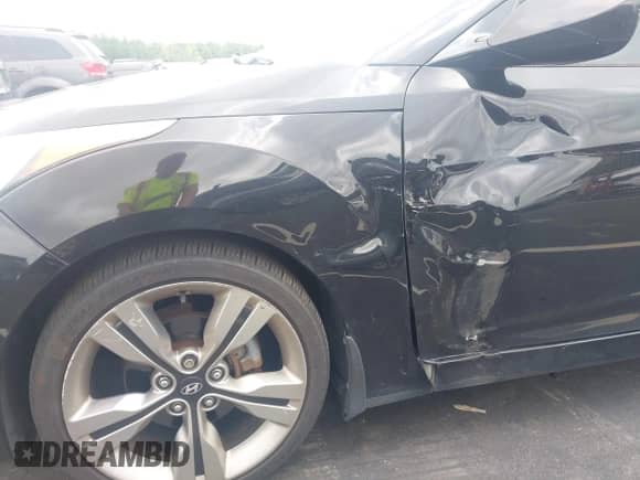 2012 Hyundai Veloster w/Red Int z VIN KMHTC6AD9CU053040, wystawiony jako IAAI lot #43019473 z przebiegiem 119 510 mil mil oraz . Historia ofert i sprzedaży dostępna na DreamBid. Obrazek 6.