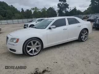 2012 Chrysler 300 C с VIN 2C3CCAETXCH109003, выставлен на аукционе Copart как лот 67315465 с пробегом 148 202 миль миль и Чистый • Clean title. История ставок и продаж доступна на DreamBid. Изображение 1.