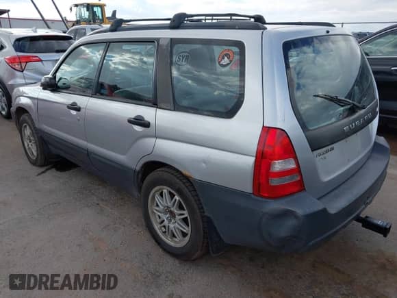 2003 Subaru Forester X with VIN JF1SG63603G718785, listed as a IAAI auction lot 43093065 with 303,249 mi miles and . Bid and sale history available at DreamBid. Image 3.