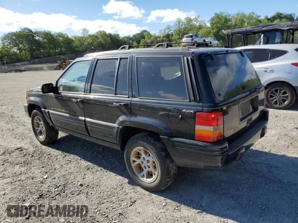 1998 Jeep Grand Cherokee Limited z VIN 1J4GZ78S0WC113869, wystawiony jako Copart lot #57723765 z przebiegiem 114 309 mil mil oraz Czysty tytuł • Clean title. Historia ofert i sprzedaży dostępna na DreamBid. Obrazek 2.
