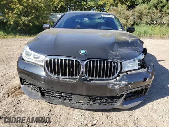 2016 BMW 7 Series 750i xDrive with VIN WBA7B0C57GG526950, listed as a Copart auction lot 81829615 with 84,030 mi miles and Clean title. Bid and sale history available at DreamBid. Image 5.
