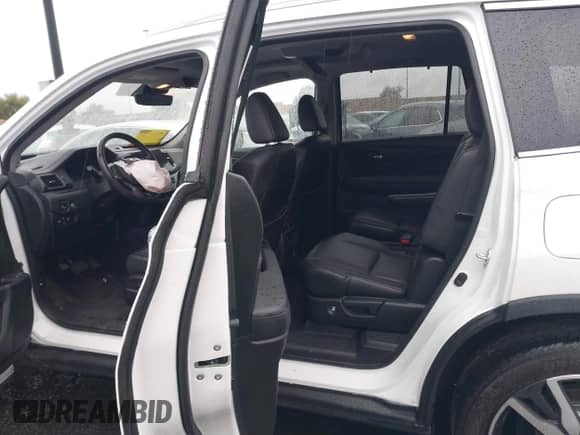 2022 Honda Pilot Touring 7-Passenger с VIN 5FNYF5H61NB016224, выставлен на аукционе IAAI как лот 41569268 с пробегом 20 613 миль миль и . История ставок и продаж доступна на DreamBid. Изображение 8.