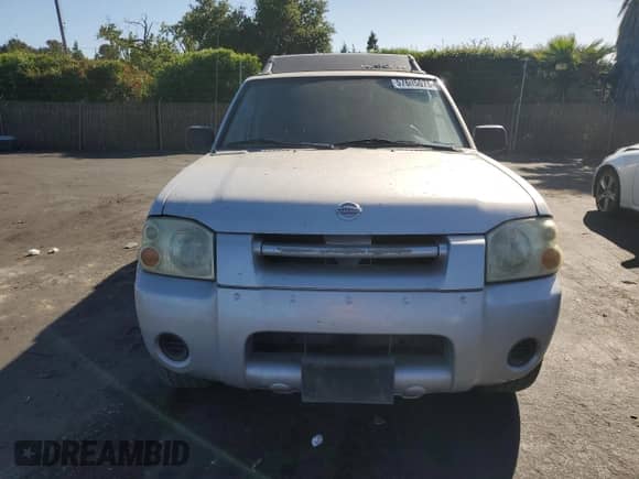 2004 Nissan Frontier XE with VIN 1N6ED29X24C429616, listed as a Copart auction lot 57605075 with 214,815 mi miles and Salvage title. Bid and sale history available at DreamBid. Image 5.