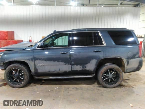 2019 Chevrolet Tahoe LS with VIN 1GNSKAEC6KR121486, listed as a IAAI auction lot 41064193 with 118,108 mi miles and . Bid and sale history available at DreamBid. Image 15.
