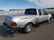 2001 Ford F-150 XL z VIN 1FTZX07261KF67717, wystawiony jako Copart lot #78946214 z przebiegiem Nie podano mil oraz Szkoda całkowita • Salvage title. Historia ofert i sprzedaży dostępna na DreamBid. Obrazek 3.