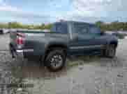 2022 Toyota Tacoma TRD Off Road with VIN 3TMCZ5AN4NM515100, listed as a Copart auction lot 84576995 with 33,917 mi miles and Salvage title. Bid and sale history available at DreamBid. Image 3.