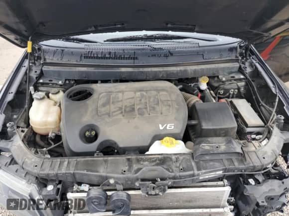 2019 Dodge Journey SE with VIN 3C4PDDBG3KT752169, listed as a Copart auction lot 53678585 with 104,996 mi miles and Salvage title. Bid and sale history available at DreamBid. Image 12.